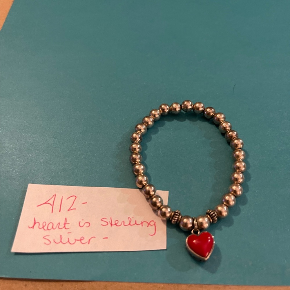 Silver bracelet with sterling silver red heart charm